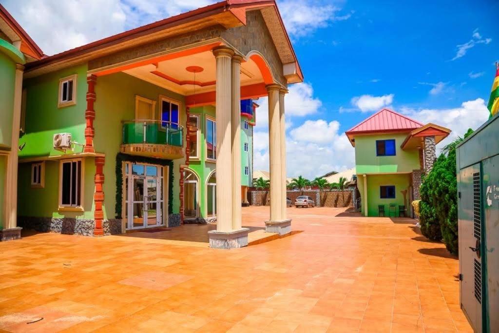 Dc Ambassadors Hotel Dawhwenya Extérieur photo